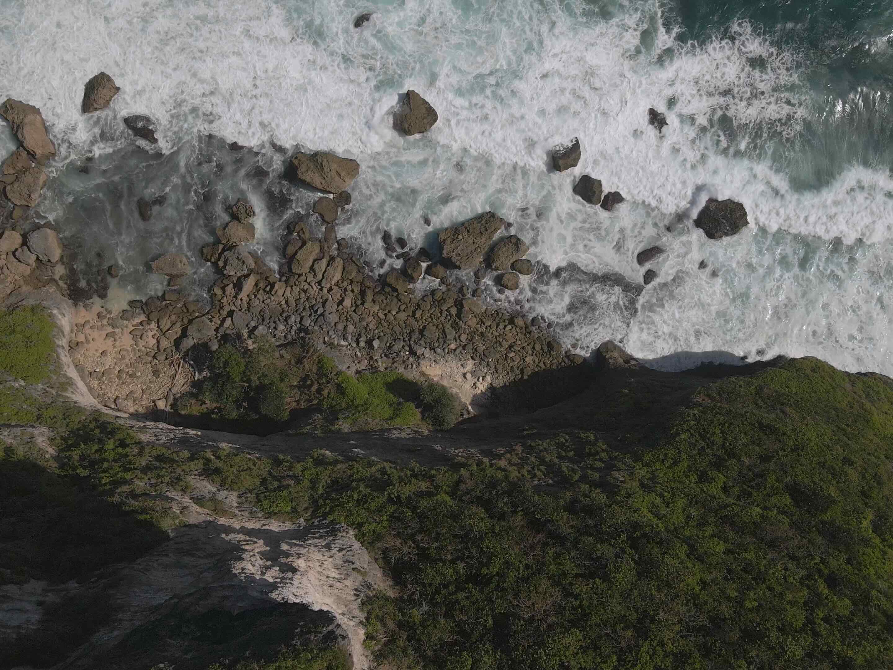 Aerial photography service of cliff over the sea
